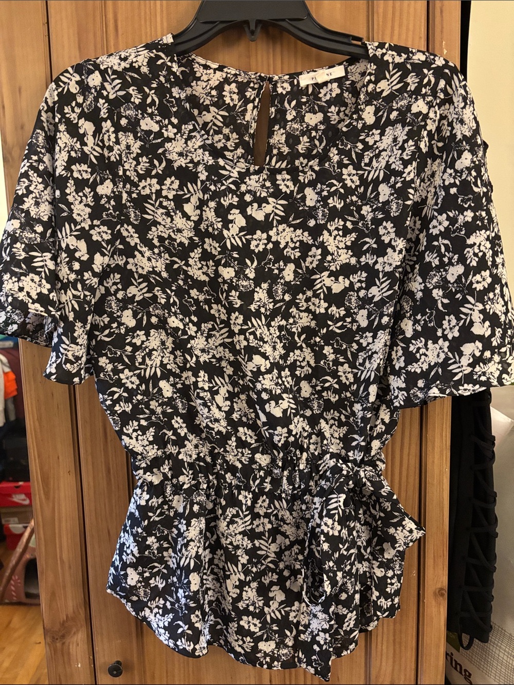 Pleione Black and White Floral Peplum Blouse